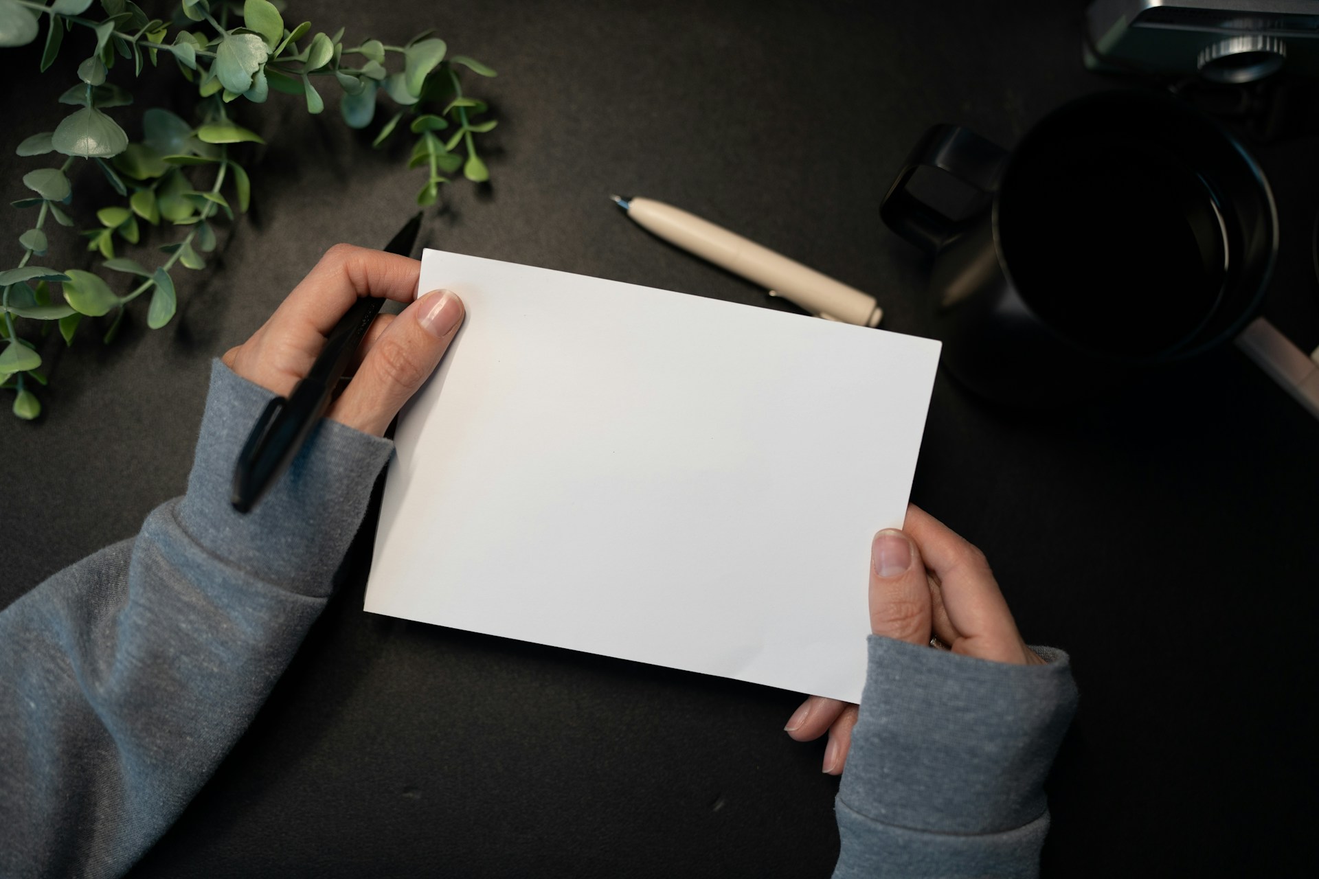 A woman holding a note